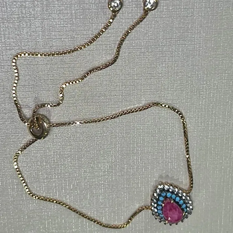 PULSEIRA REGULÁVEL - CRAVEJADA ZIRCONIAS - NANO TURQUESA - GOTA - BANHO OURO 18K