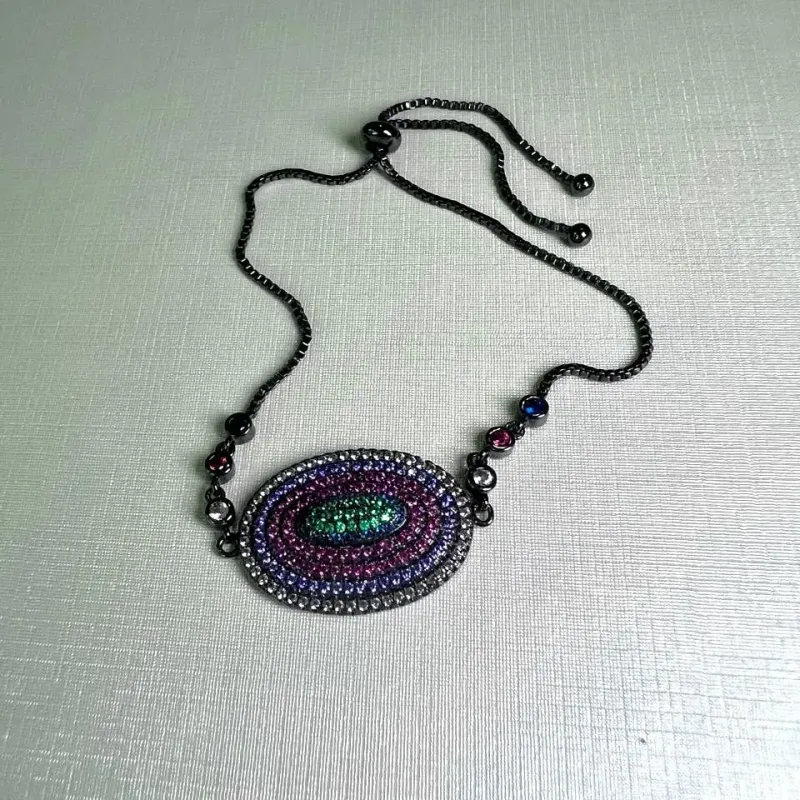 PULSEIRA CRAVEJADA ZIRCONIAS COLORIDAS - OVAL - BANHO RÓDIO NEGRO
