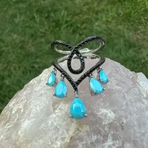 ANEL GOTAS TURQUESAS - MICROZIRCONIAS NEGRAS - BANHO RODIO BRANCO ANEL GOTAS TURQUESAS - MICROZIRCONIAS NEGRAS - BANHO RODIO BRANCO