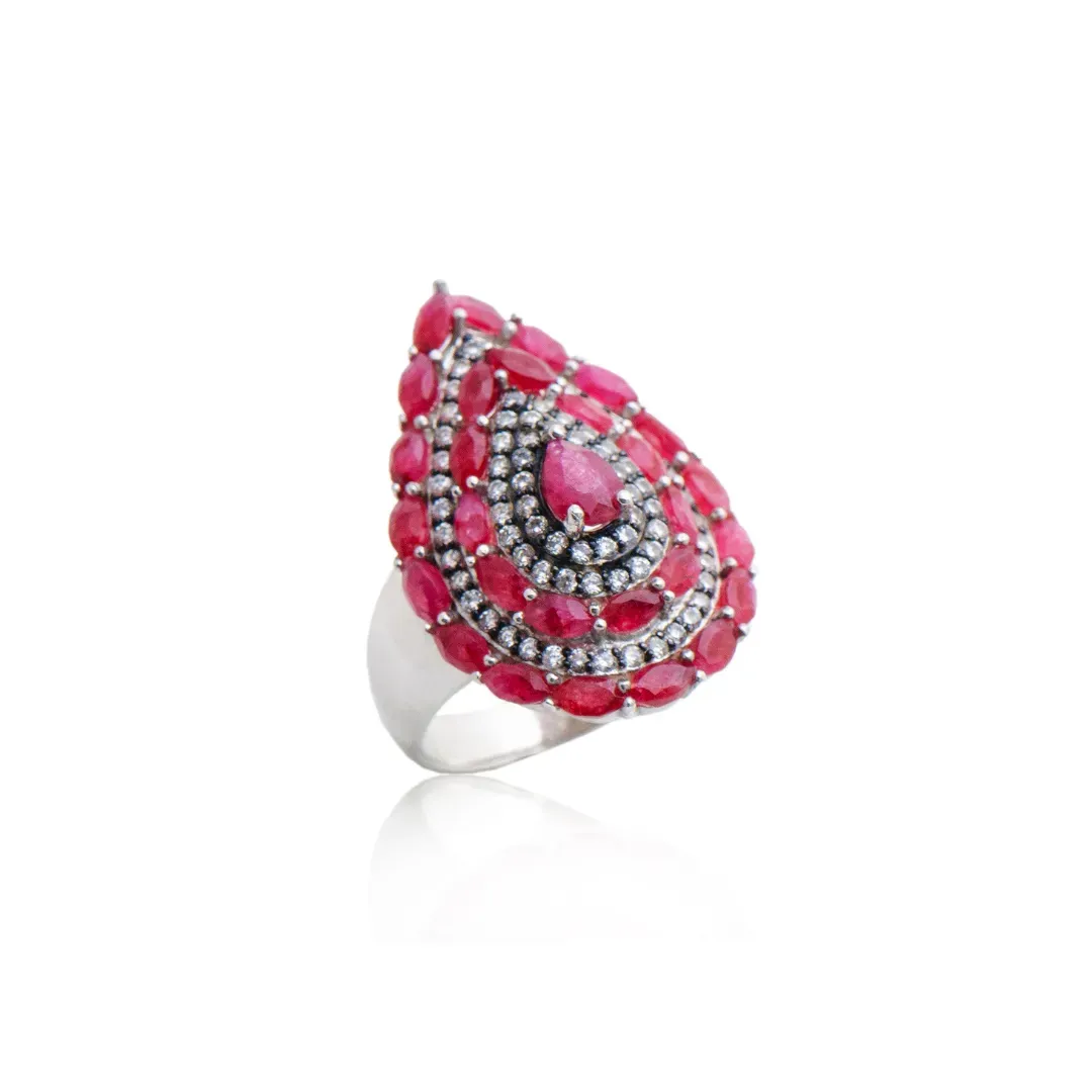 ANEL PEDRA RUBI CRAVEJADO DE ZIRCONIAS BRANCAS