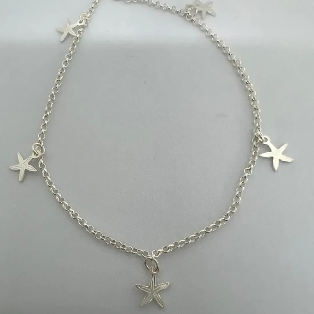 TORNOZELEIRA PRATA 925 PINGENTES DE ESTRELA