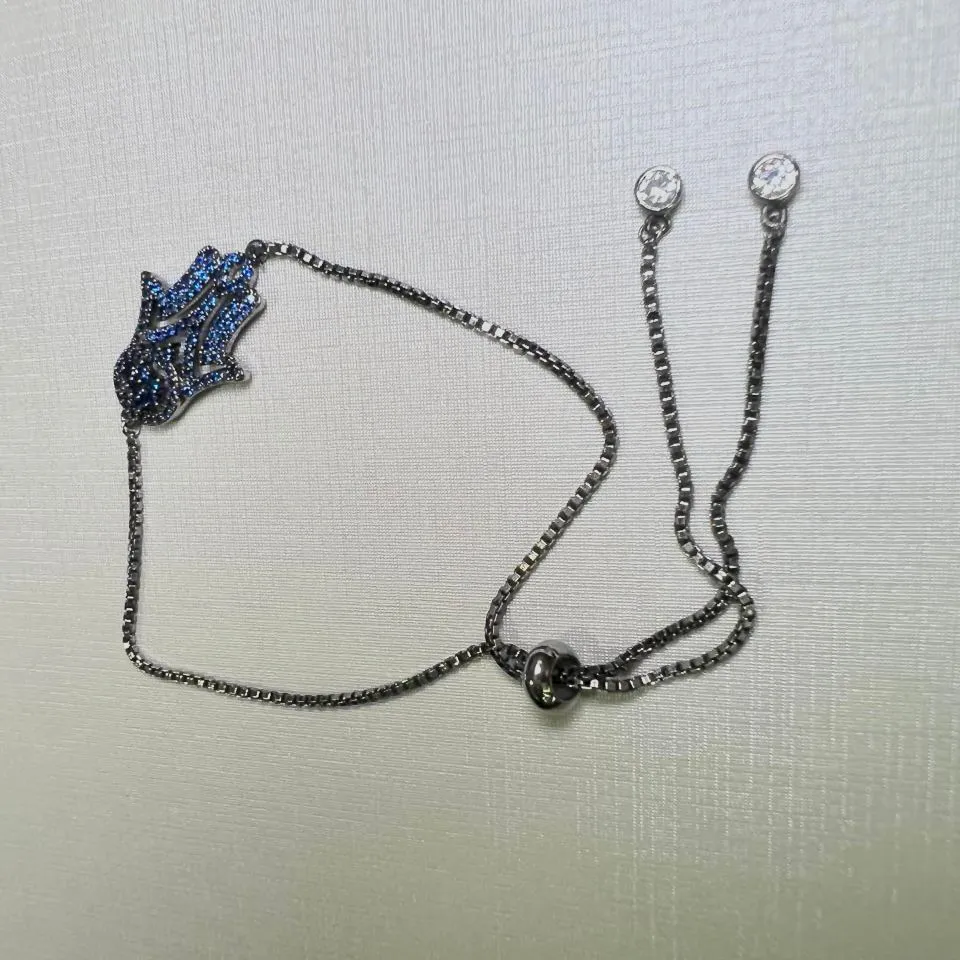 PULSEIRA REGULAVEL - MÃO DE FATIMA - BANHO RODIO NEGRO